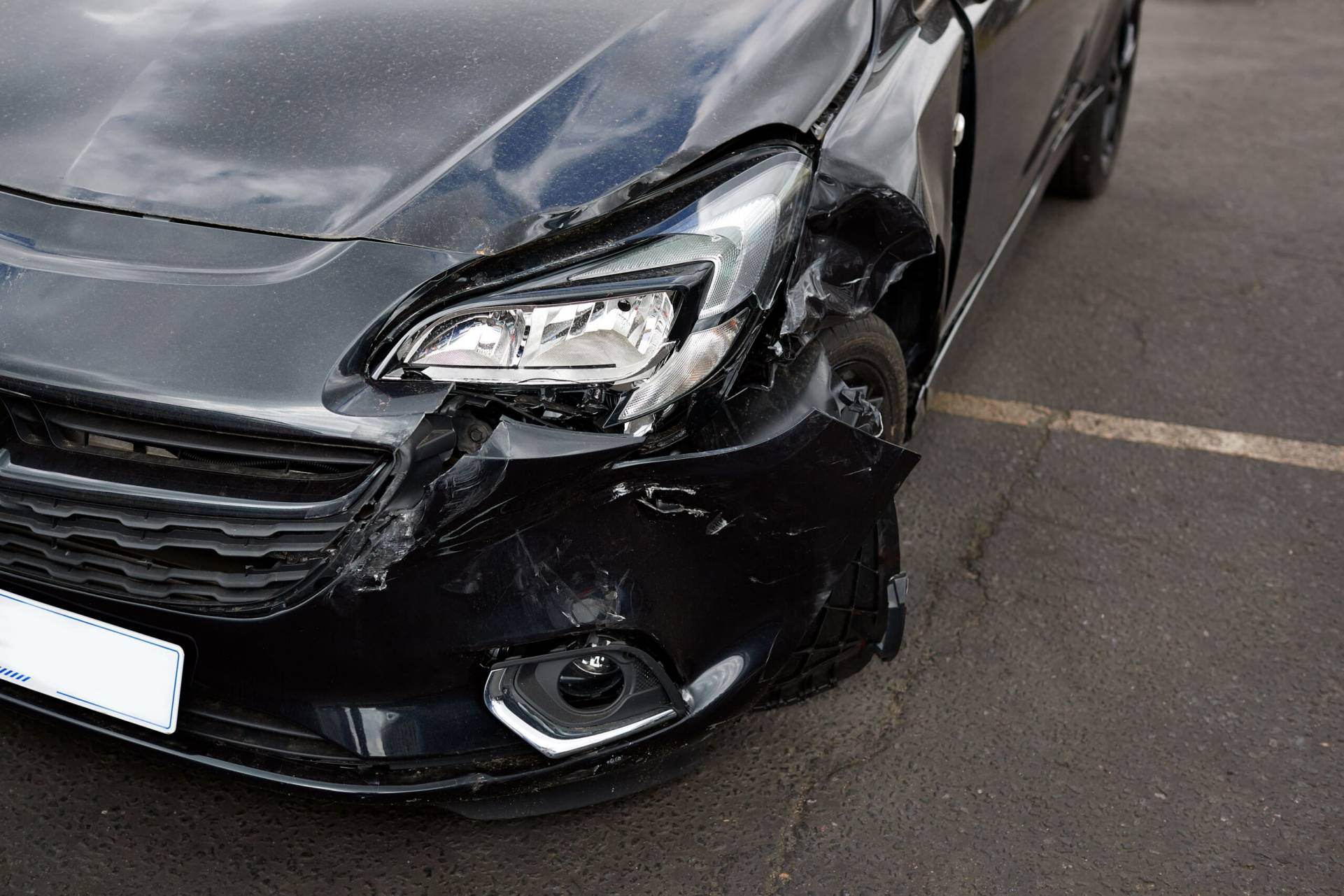 detail of damage to headlight of vehicle in car 5rsklqa